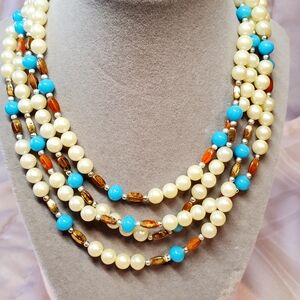 Vintage Japan signed 4 strand necklace